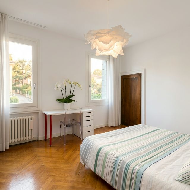 Bright master bedroom with natural light