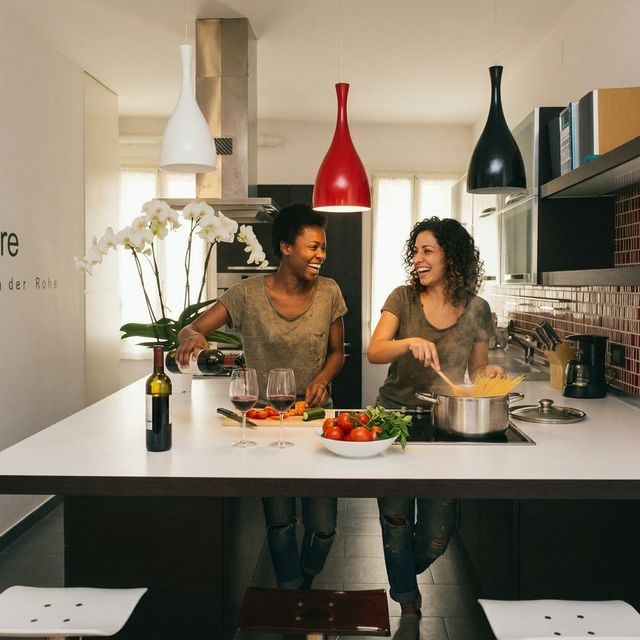 BRW House kitchen with friends cooking pasta